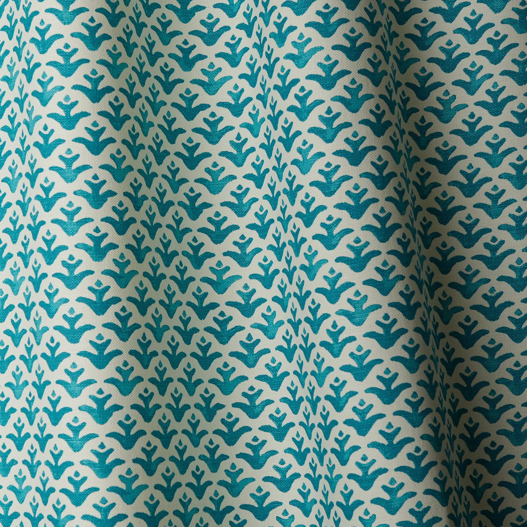 Fabric with Mineral Blue colored flower motif hand-painted with watercolours